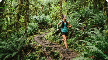 woman trail running